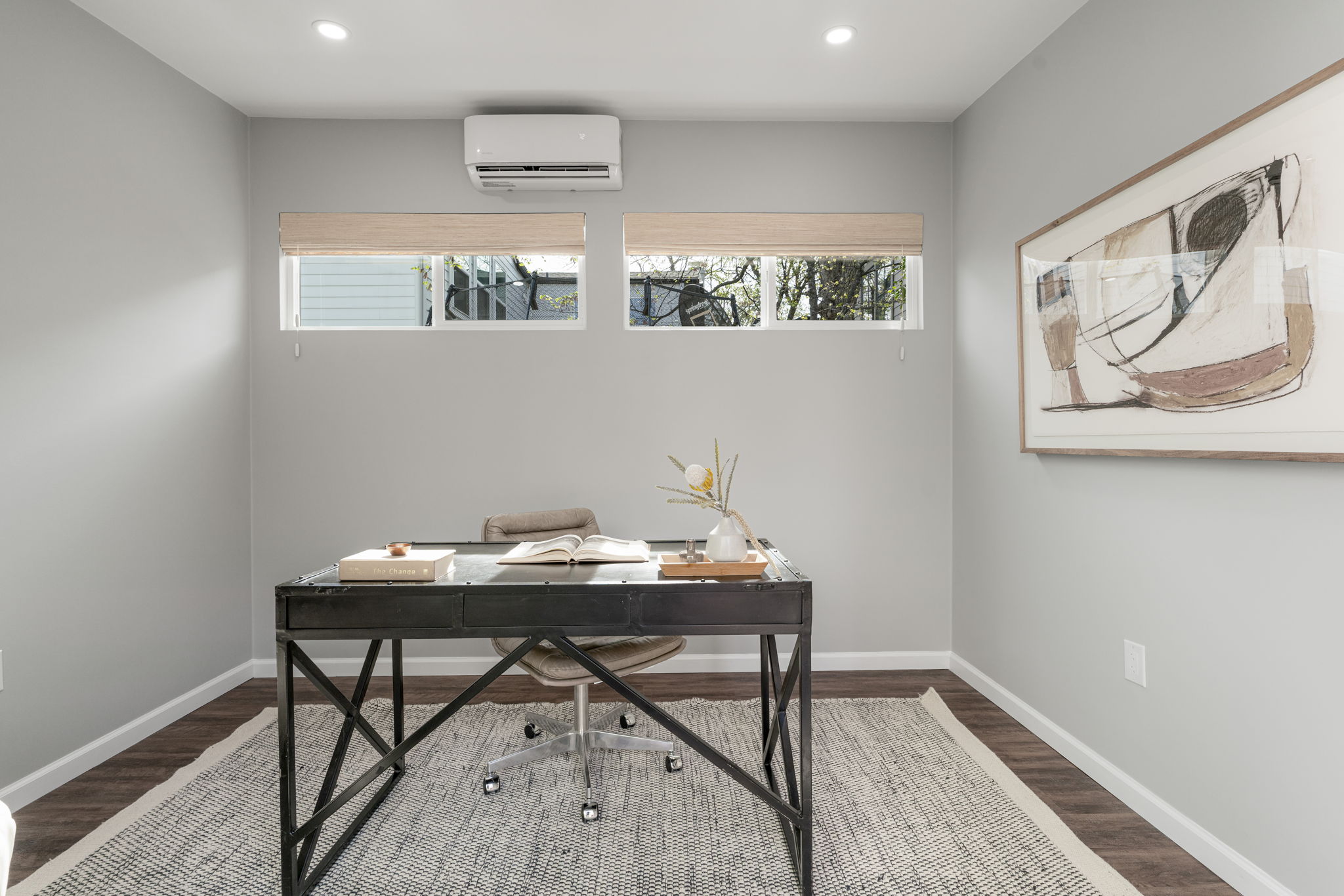 605 Harris Avenue Austin, TX 78705 - Photo 29 of 34 Its own mini-split keeps the office pod comfortable year-round. The windows let in light without distraction making this a workspace designed for focus.