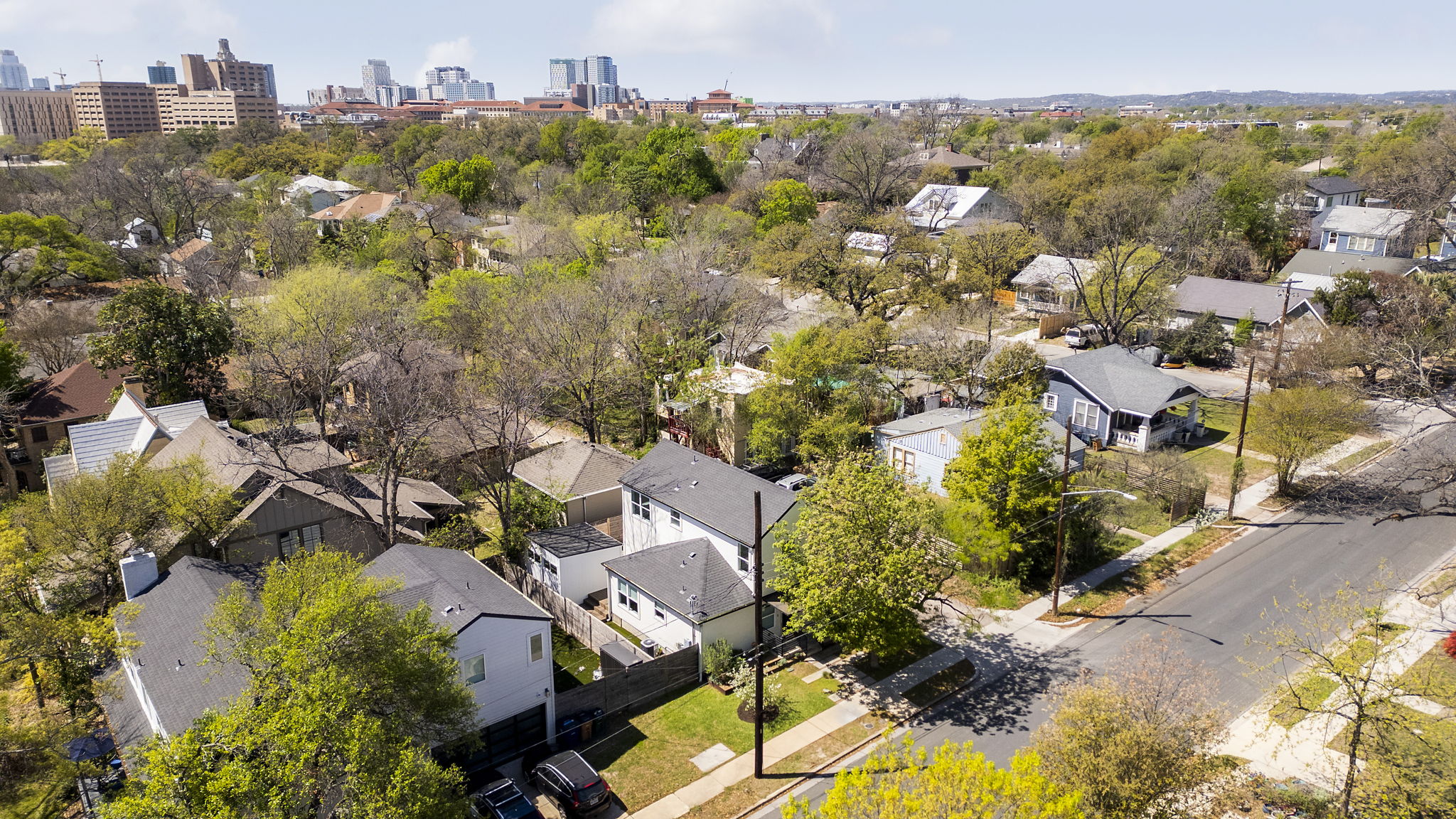 605 Harris Avenue Austin, TX 78705 - Photo 33 of 34 The downtown Austin skyline is just beyond the treetops, a reminder of exactly how close to everything this address really is.