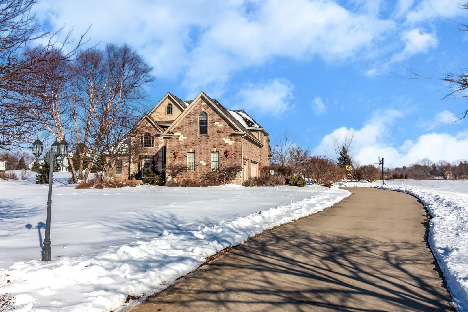 8306 Heather Ridge Spring Grove, IL 60081 - Photo 3 of 43 a front view of a house with a yard