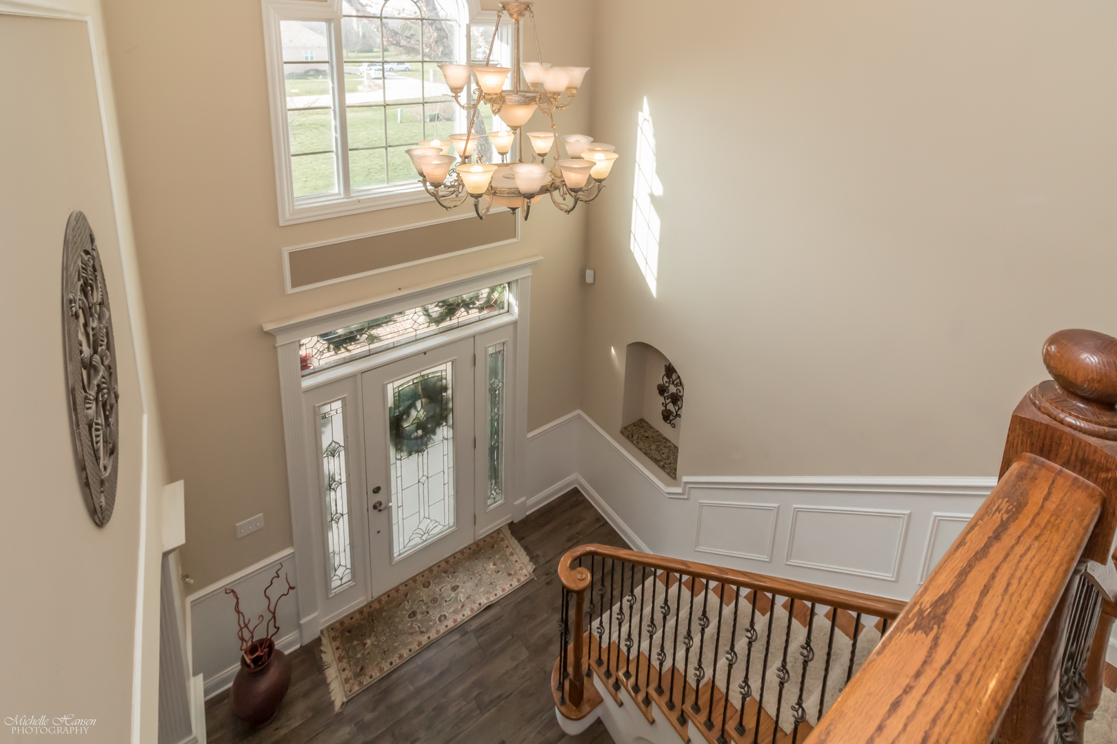 8306 Heather Ridge Spring Grove, IL 60081 - Photo 4 of 43 a view of a hallway with windows and stairs