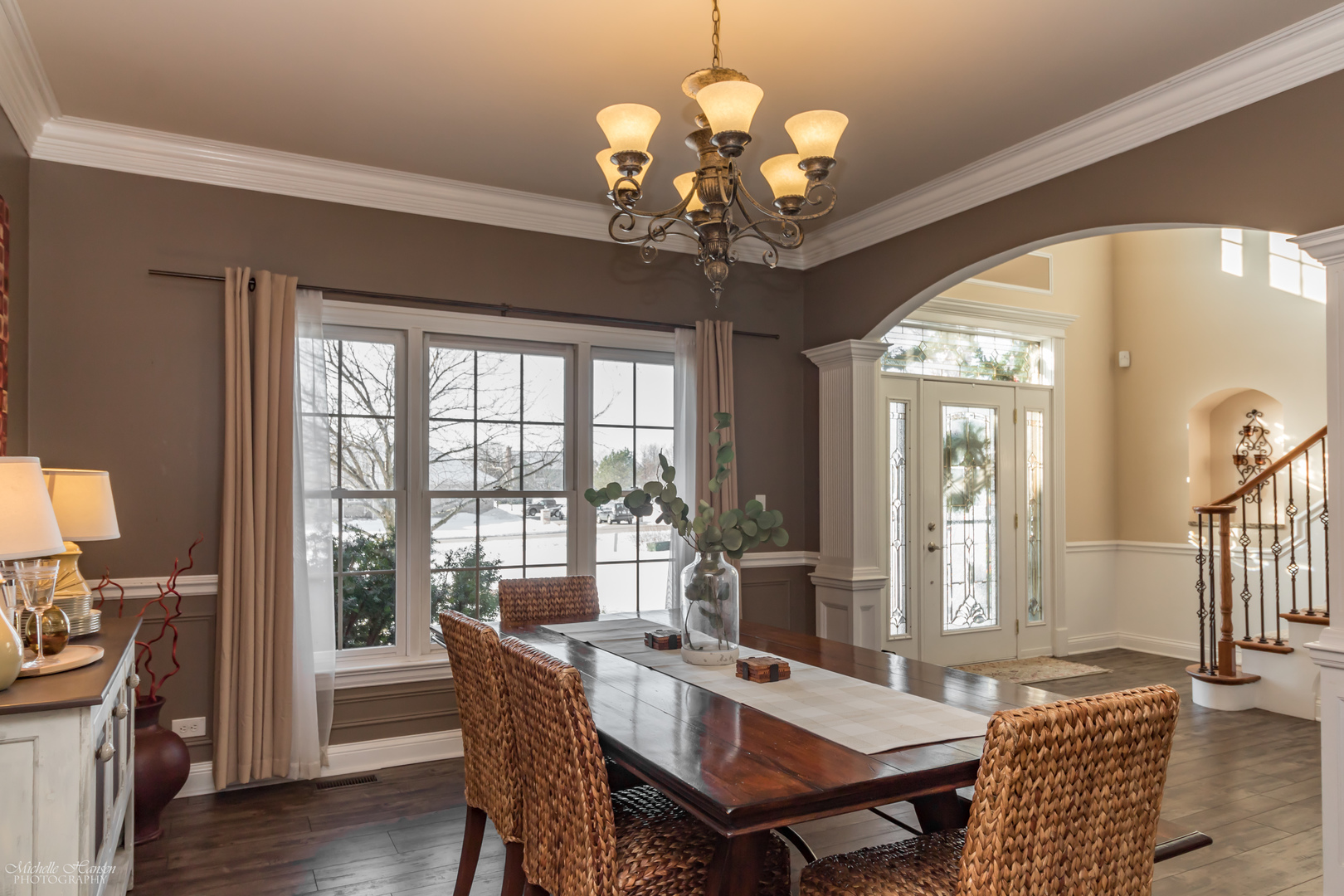 8306 Heather Ridge Spring Grove, IL 60081 - Photo 8 of 43 a view of a dining room with furniture wooden floor and chandelier