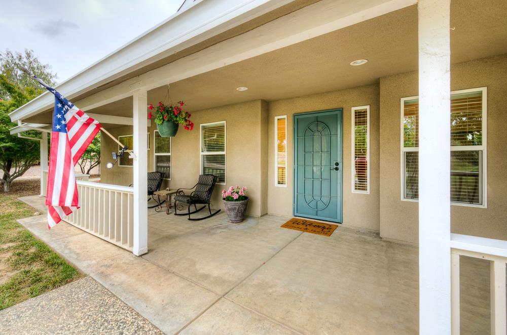 17465 Monreal Road Madera, CA 93636 - Photo 4 of 59 a view of an outdoor space