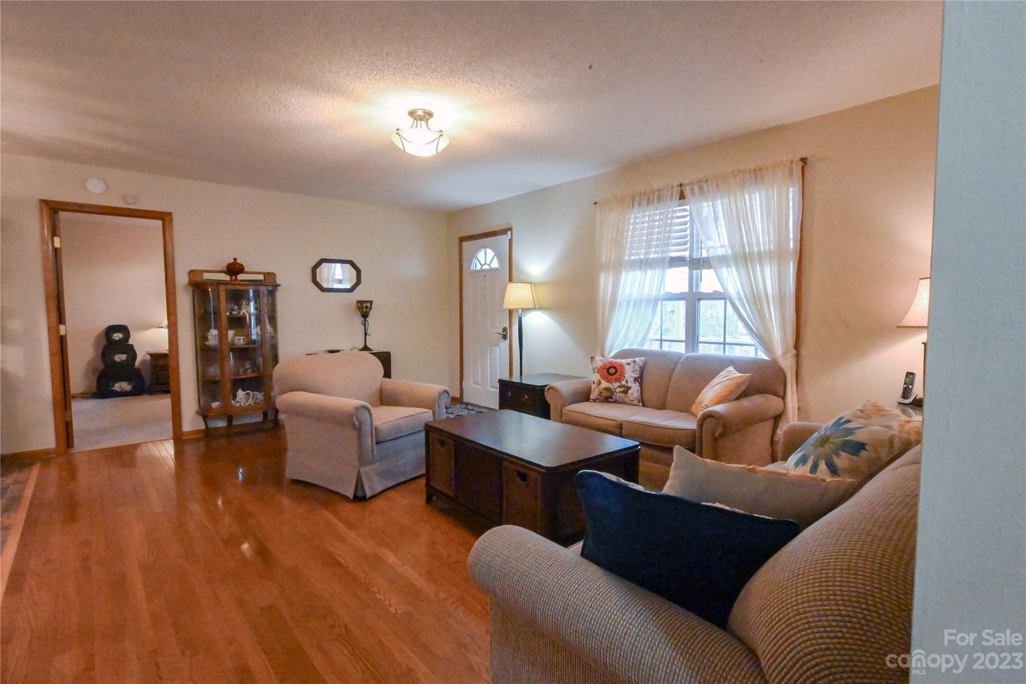 2965 Greenleaf Road Clover, SC 29710 - Photo 13 of 30 a living room with furniture window and wooden floor