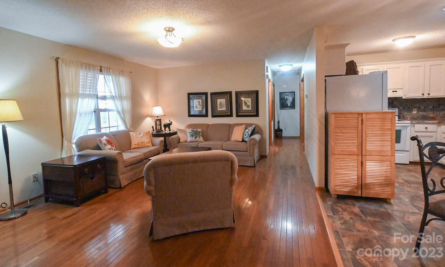 2965 Greenleaf Road Clover, SC 29710 - Photo 14 of 30 a living room with furniture and a wooden floor