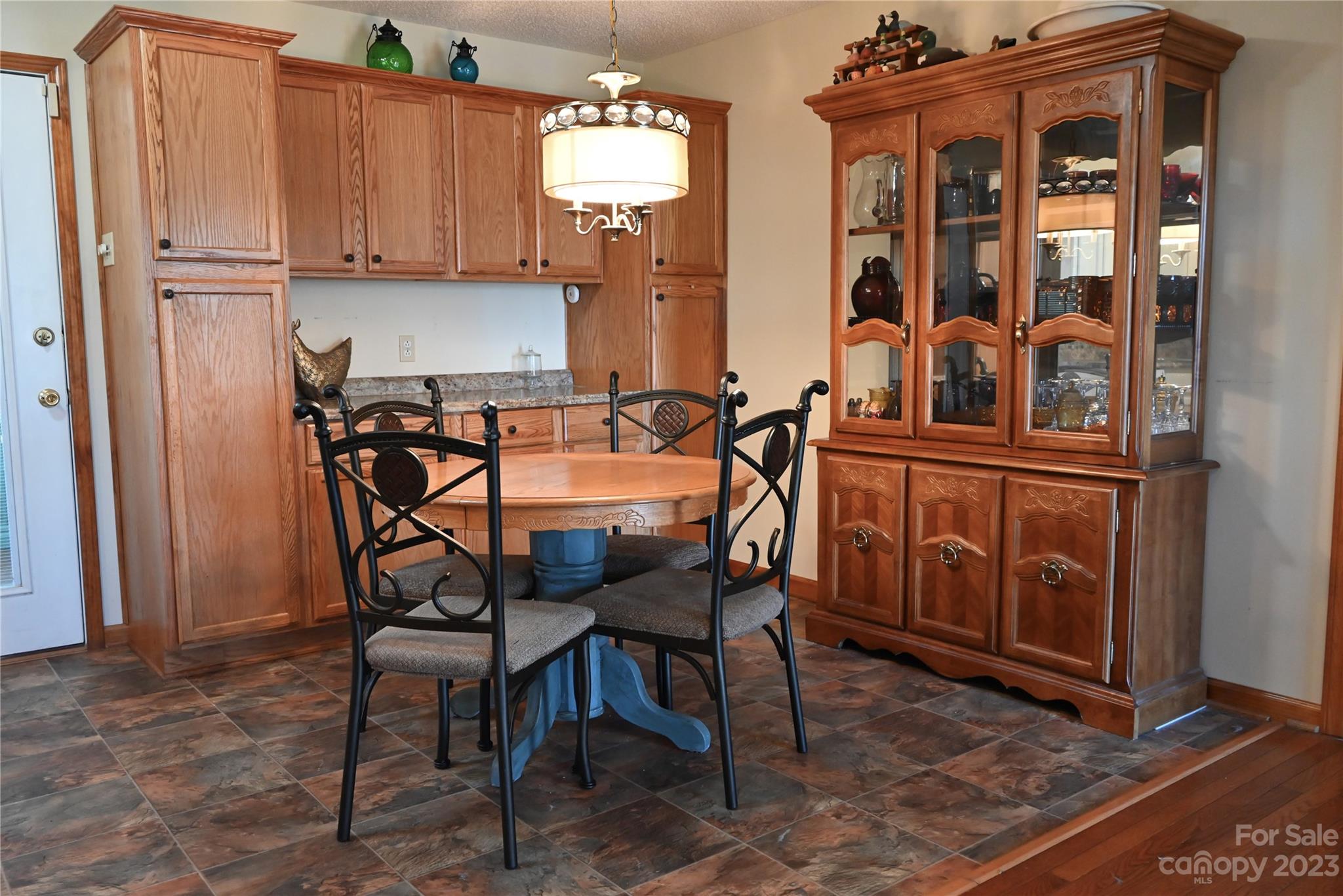 2965 Greenleaf Road Clover, SC 29710 - Photo 21 of 30 a view of a dining room with furniture and chandelier