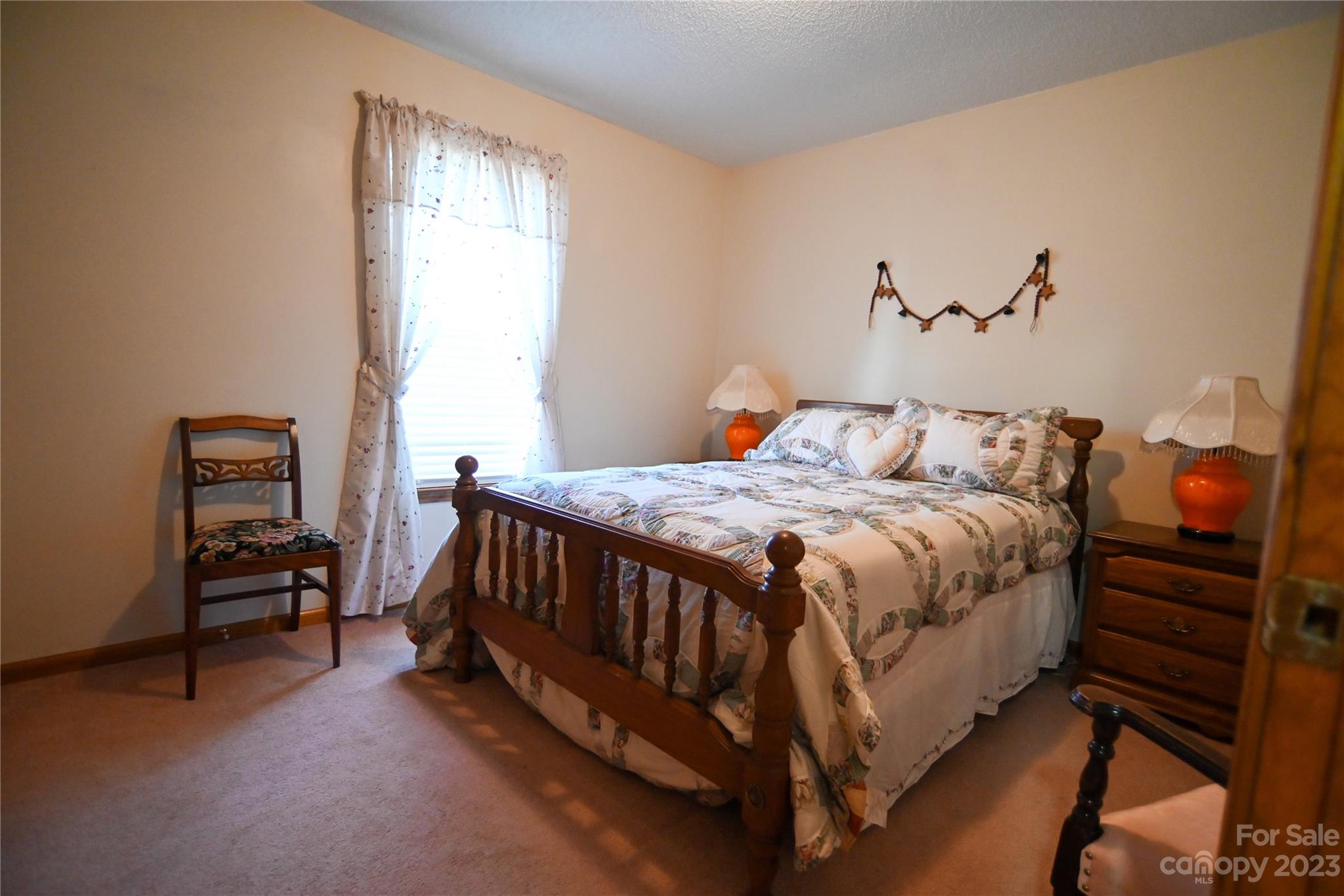2965 Greenleaf Road Clover, SC 29710 - Photo 27 of 30 a bedroom with a bed and a window