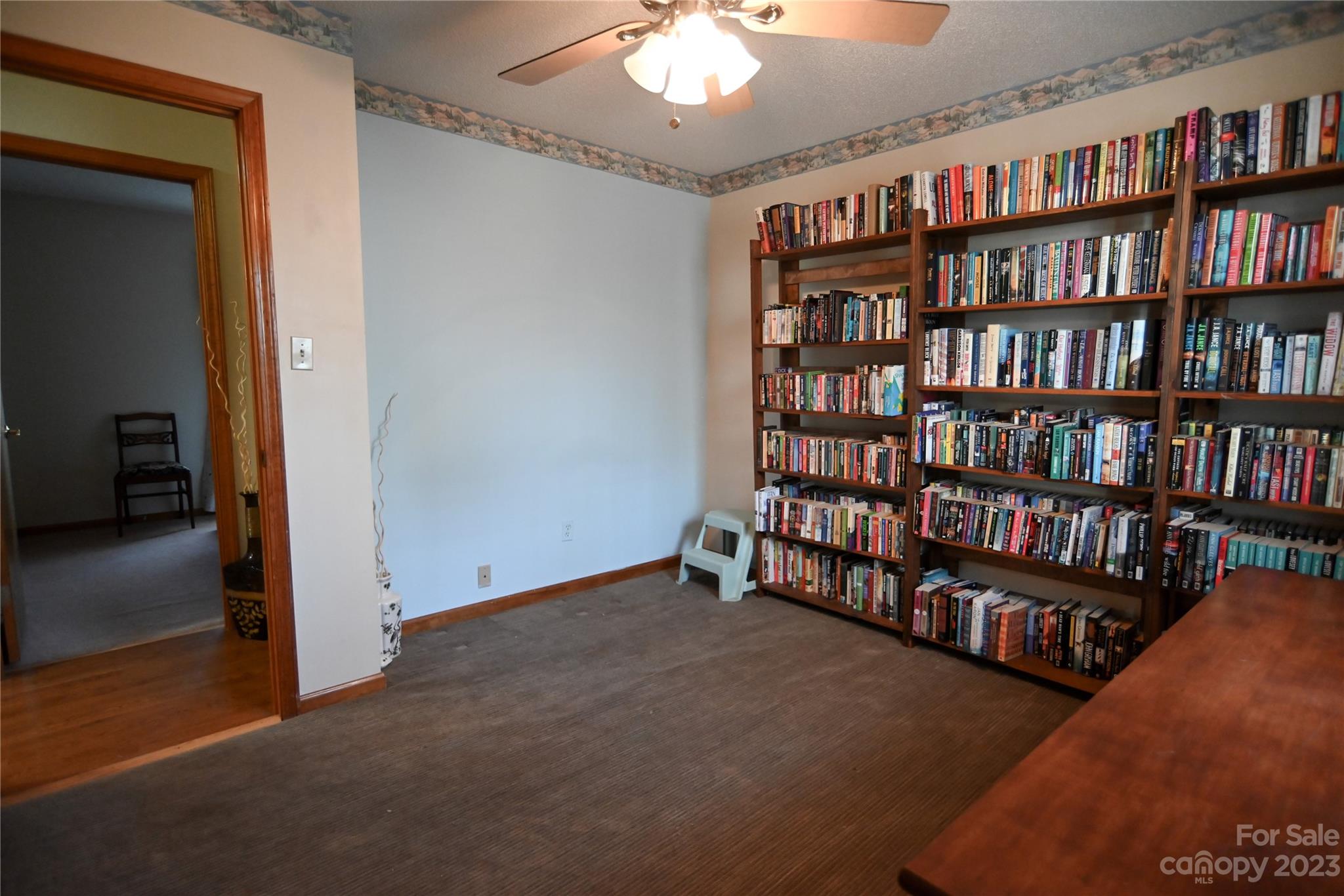 2965 Greenleaf Road Clover, SC 29710 - Photo 30 of 30 a view of an empty room with furniture and book shelf