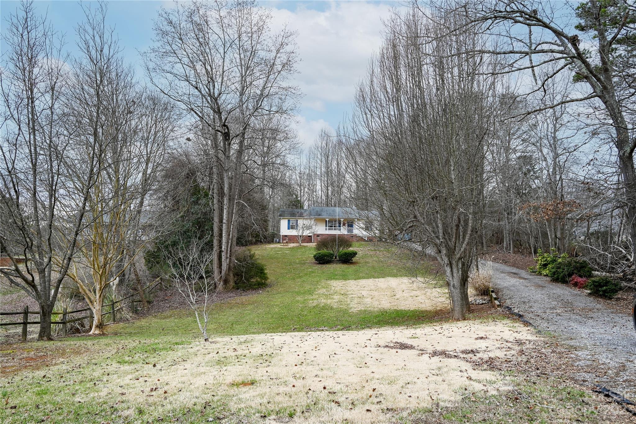 2965 Greenleaf Road Clover, SC 29710 - Photo 4 of 30 a view of a yard with plants and trees