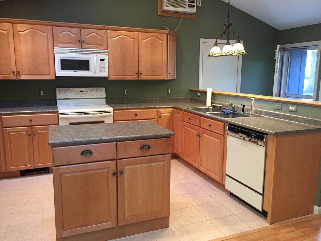 177 West Autumn Road West Springfield, MA 01089 - Photo 4 of 12 a kitchen with stainless steel appliances granite countertop a sink stove and microwave