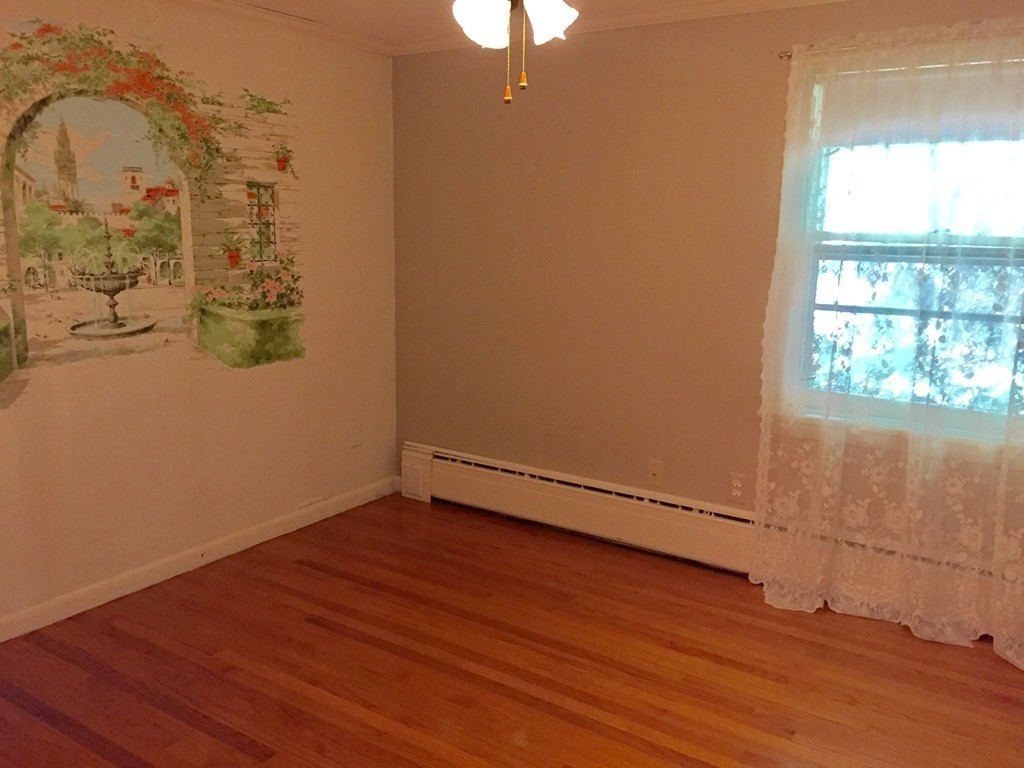 177 West Autumn Road West Springfield, MA 01089 - Photo 9 of 12 an empty room with wooden floor and windows