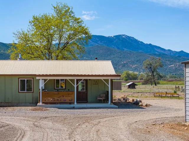 a kitchen with stainless steel appliances granite countertop a stove and a microwave