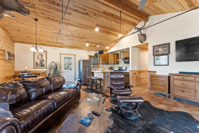 a view of a livingroom with furniture