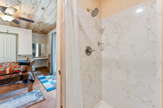 a view of a street with a building in the background