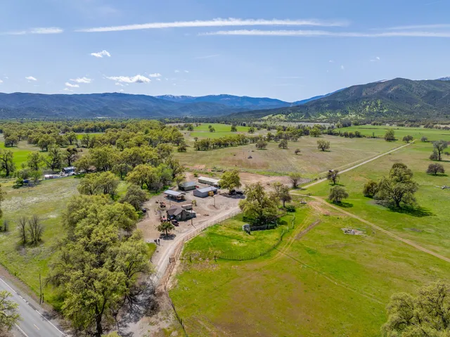 a view of an ocean and a mountain