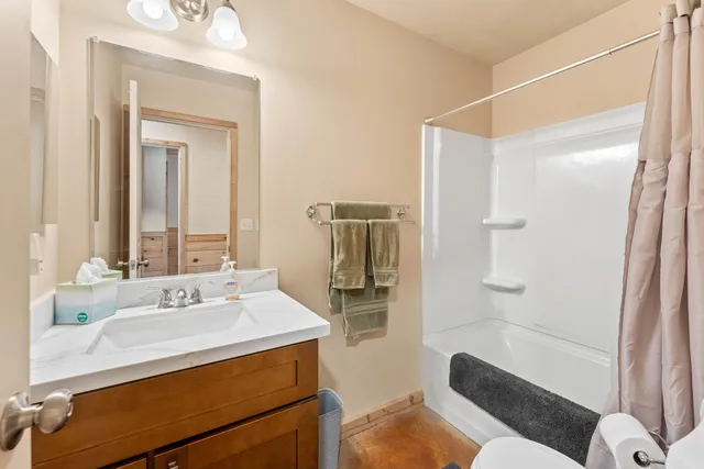 a view of a town with mountains in the background