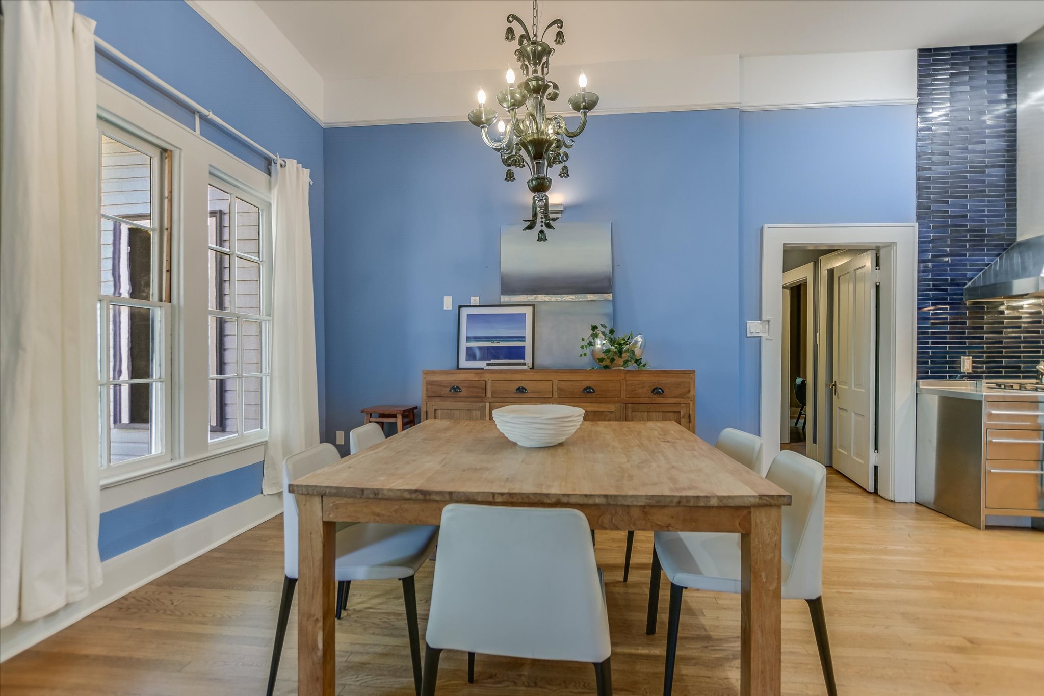 2109 Nickerson Street Austin, TX 78704 - Photo 4 of 23 a view of a dining room with furniture and wooden floor