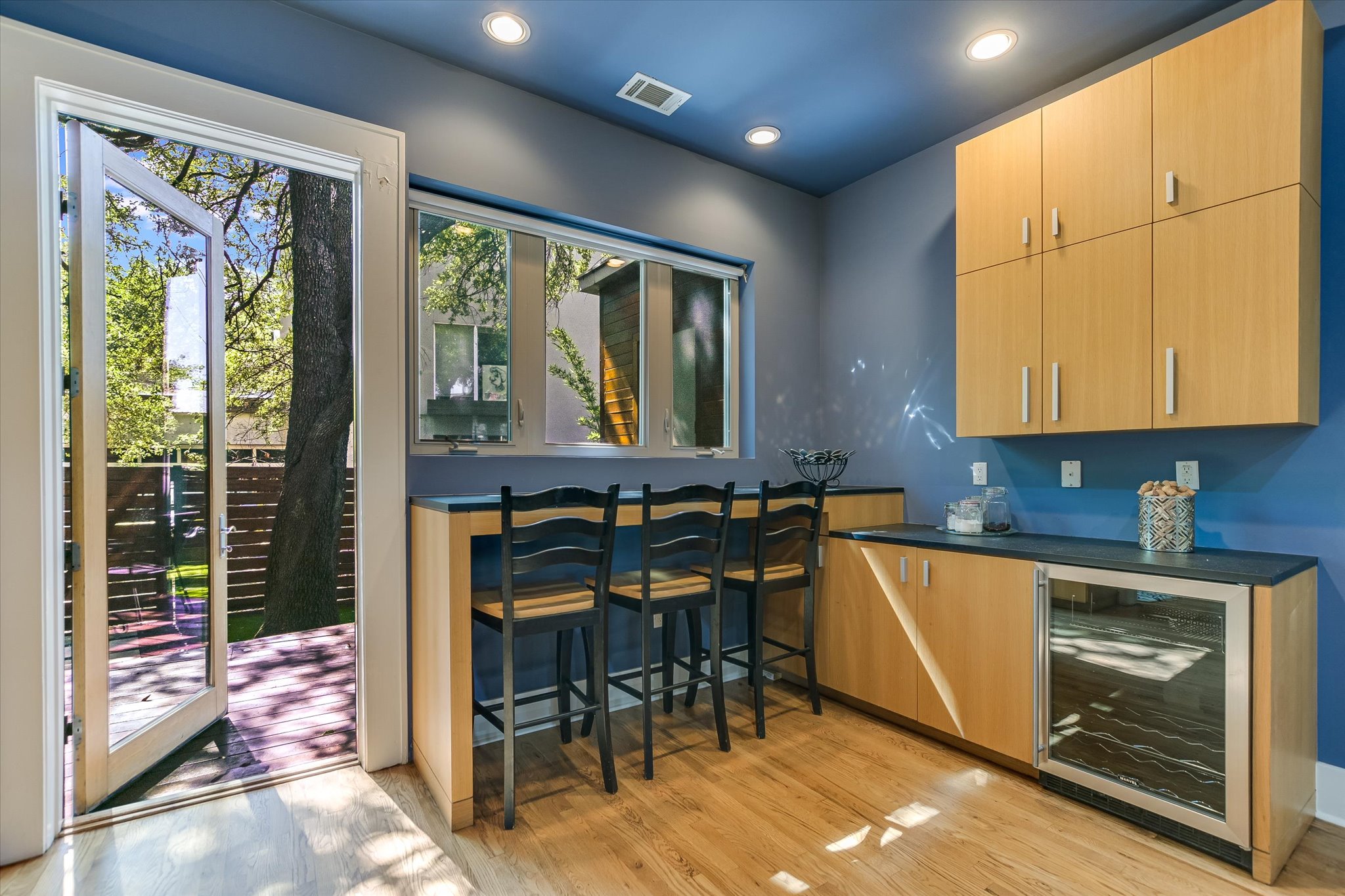 2109 Nickerson Street Austin, TX 78704 - Photo 8 of 23 a kitchen with a sink a table and chairs in it