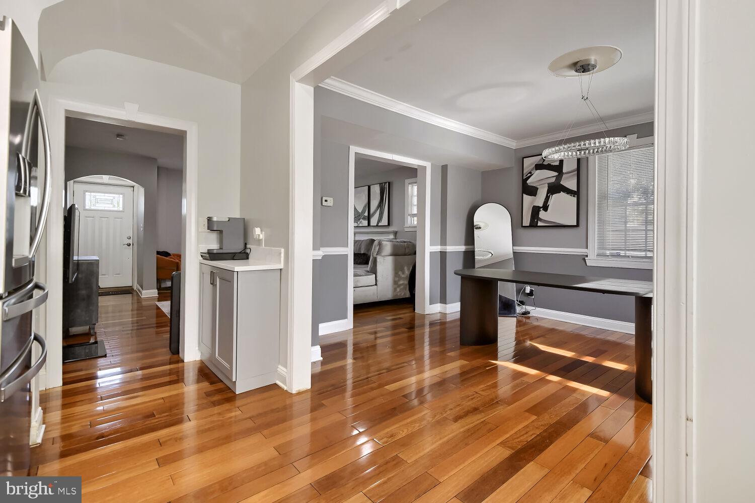 4012 Hillen Road Baltimore, MD 21218 - Photo 5 of 14 Elegant open space with warm tones.