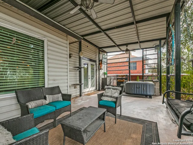 a outdoor living space with furniture and a couch