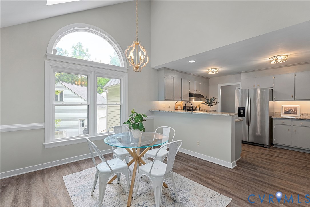 14308 Chimney House Road Midlothian, VA 23112 - Photo 21 of 52 Dining area featuring a soaring vaulted ceiling, a