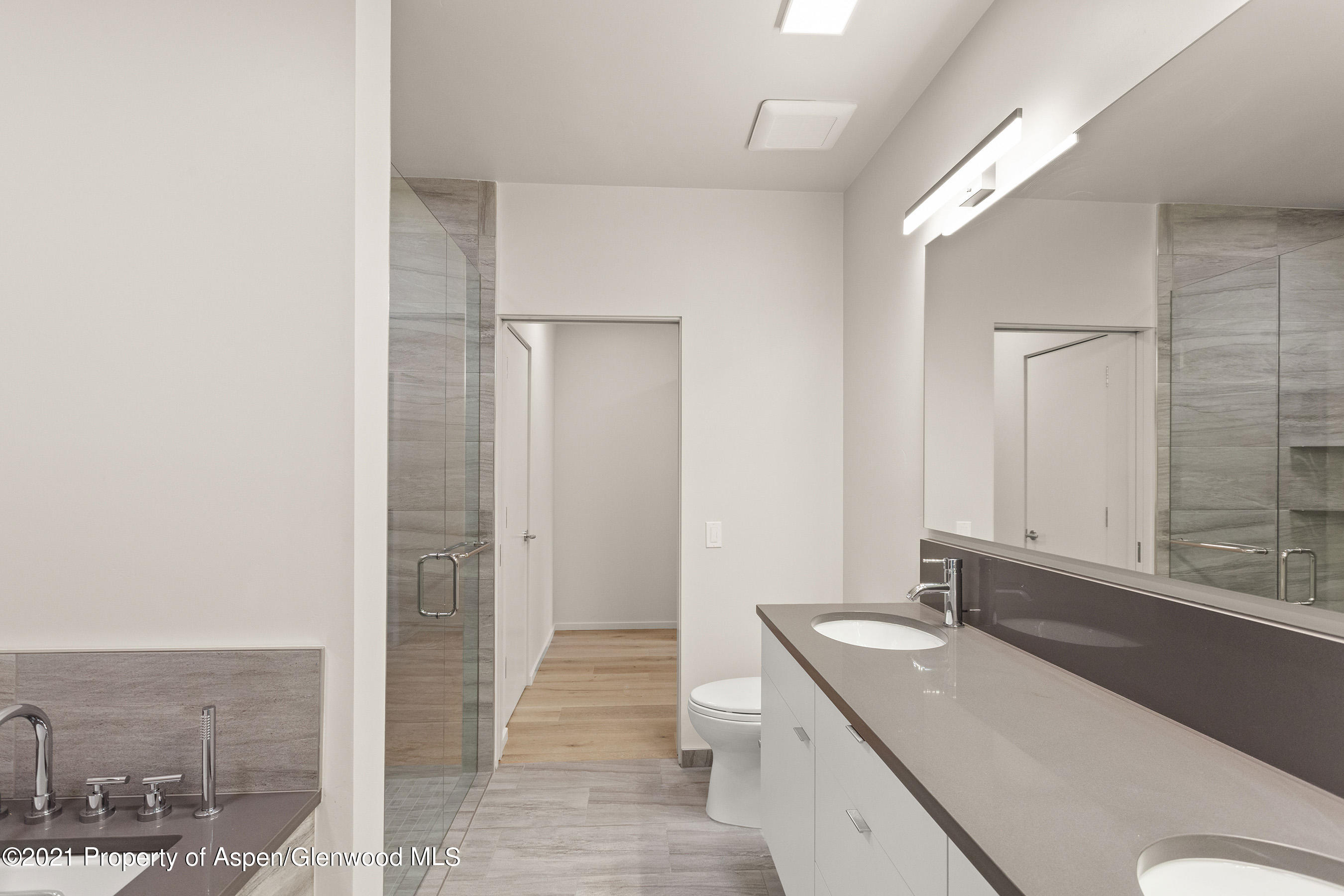 101 Willits Lane, Unit 202 Basalt, CO 81621 - Photo 9 of 12 a bathroom with a sink and a mirror