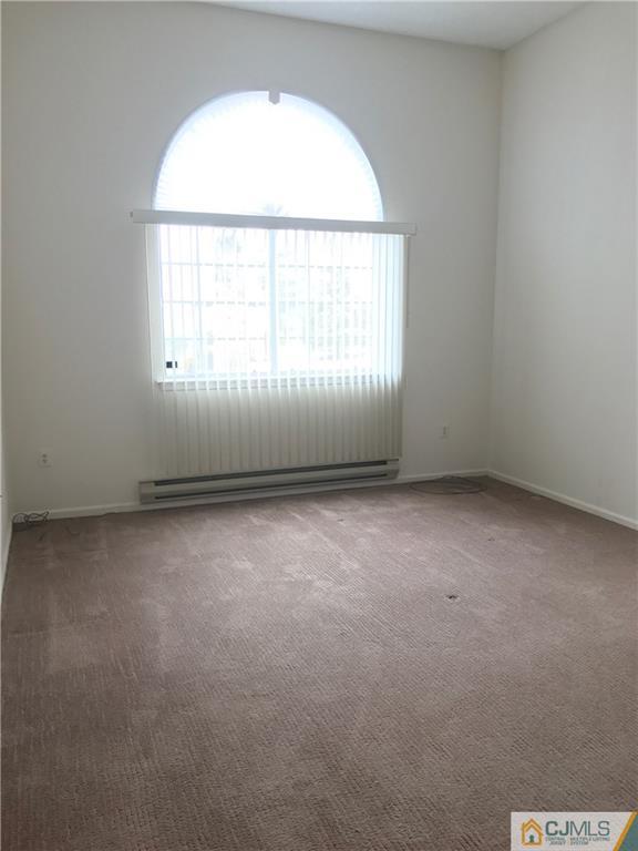 838 C Vail Road Monroe Township, NJ 08831 - Photo 9 of 20 an empty room with a window