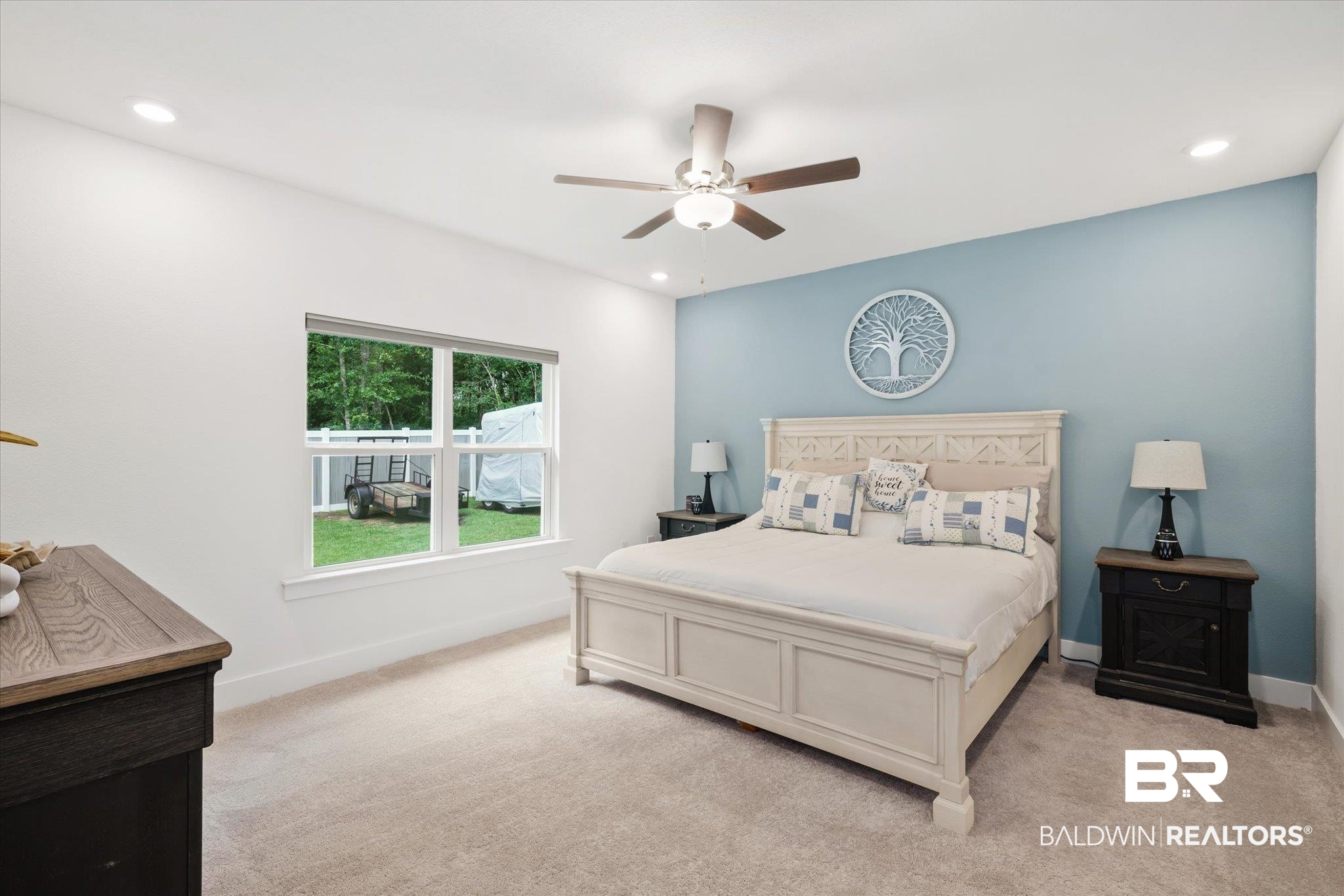 263 Bronze Street Fairhope, AL 36532 - Photo 15 of 47 Bedroom with ceiling fan and light carpet
