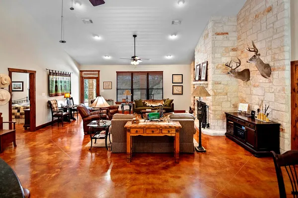 a kitchen with a sink cabinets and window