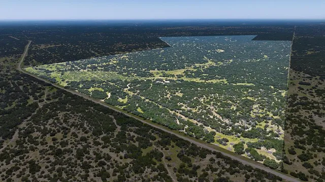 a view of a house with backyard porch and sitting area