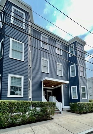 604 Freeport Street, Unit PH 5 Boston, MA 02122 - Photo 3 of 38 a front view of a building