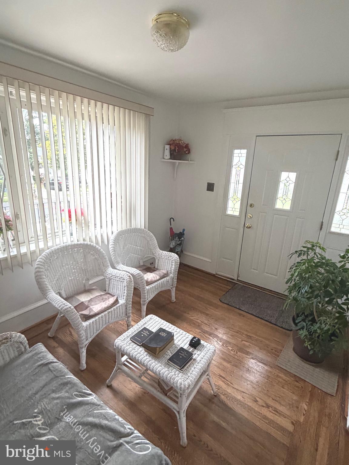 463 Burmont Road Drexel Hill, PA 19026 - Photo 15 of 39 a living room with furniture and a potted plant