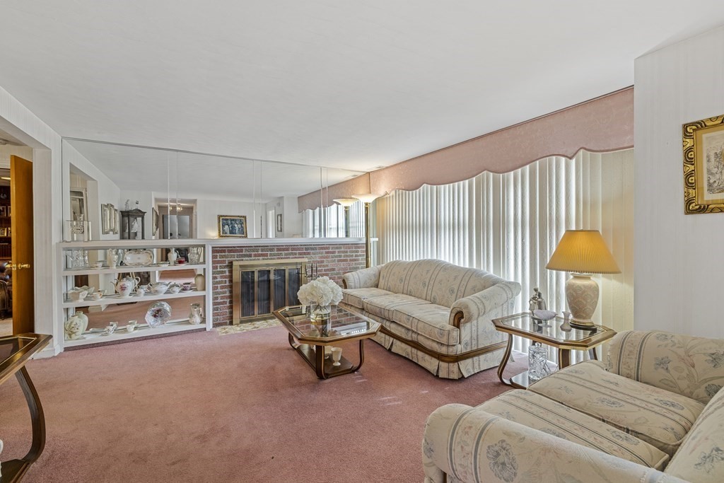 25 Westlake Road Natick, MA 01760 - Photo 3 of 25 a living room with furniture and a lamp