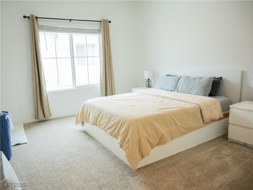 7342 North Decatur Boulevard, Unit 5 North Las Vegas, NV 89084 - Photo 16 of 29 View of carpeted bedroom