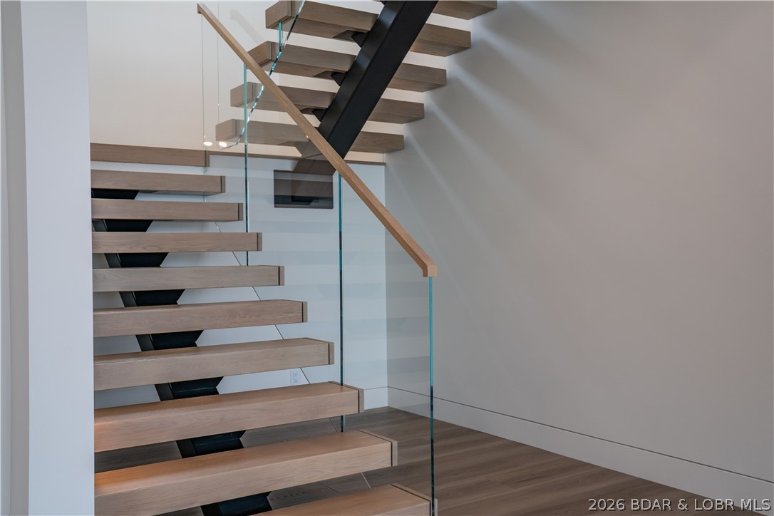 235 East Villages Estates Road Sunrise Beach, MO 65079 - Photo 31 of 64 ViewRail Floating Staircase glass railing