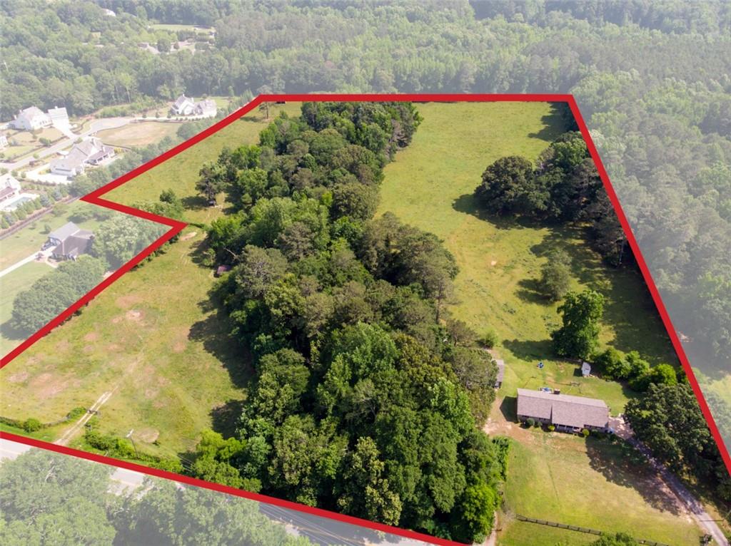 a view of a yard with an outdoor seating