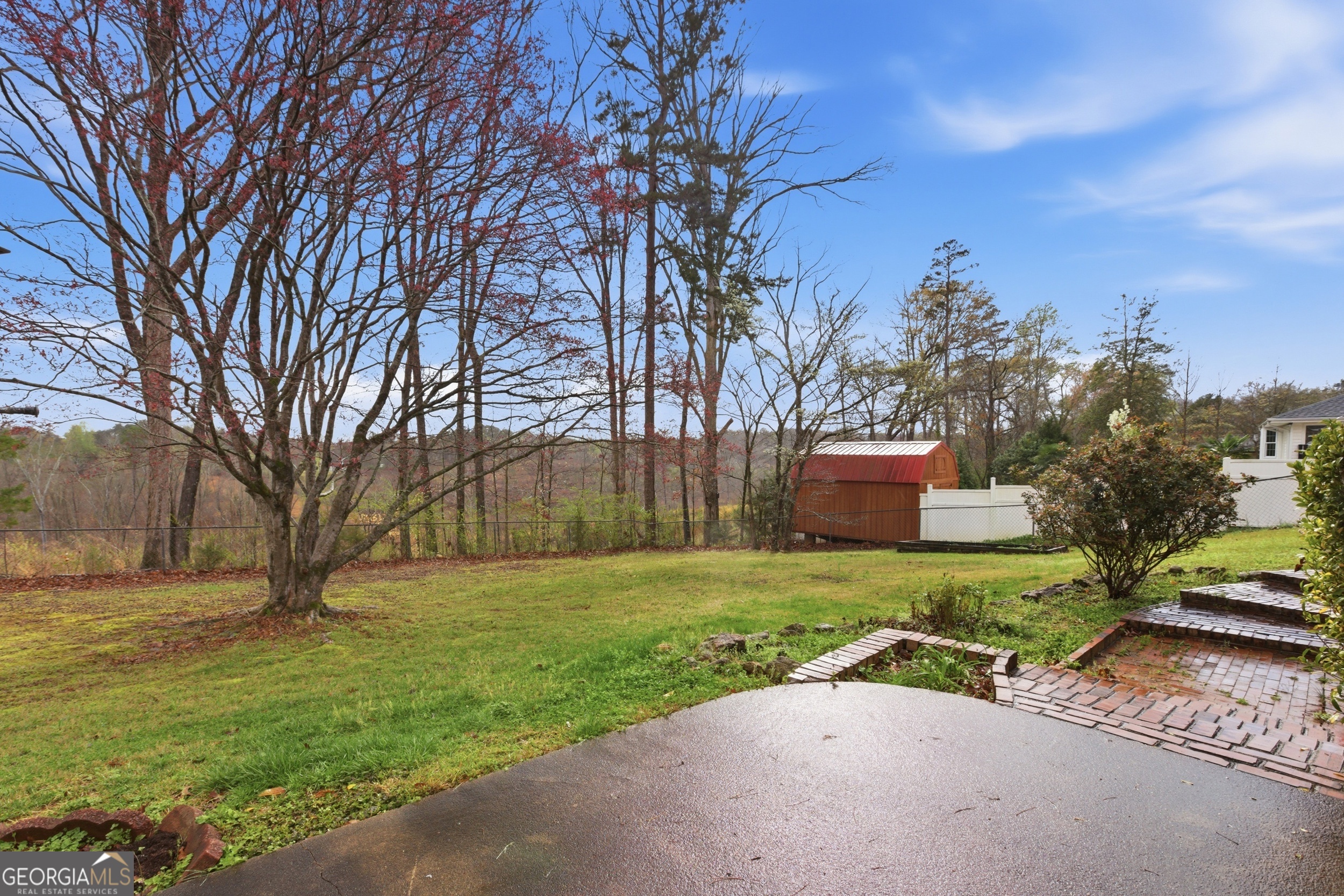304 Beaverbrook Drive Toccoa, GA 30577 - Photo 16 of 53 a big house with a big yard and large trees