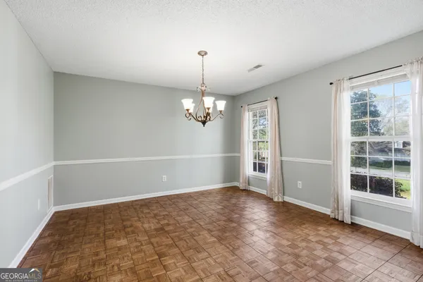 a view of a livingroom with a chandelier