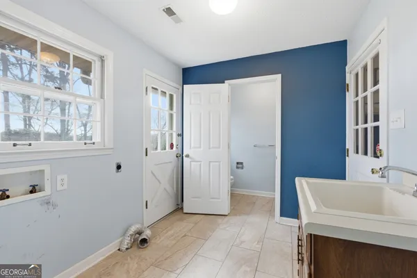 a room with a washer and dryer