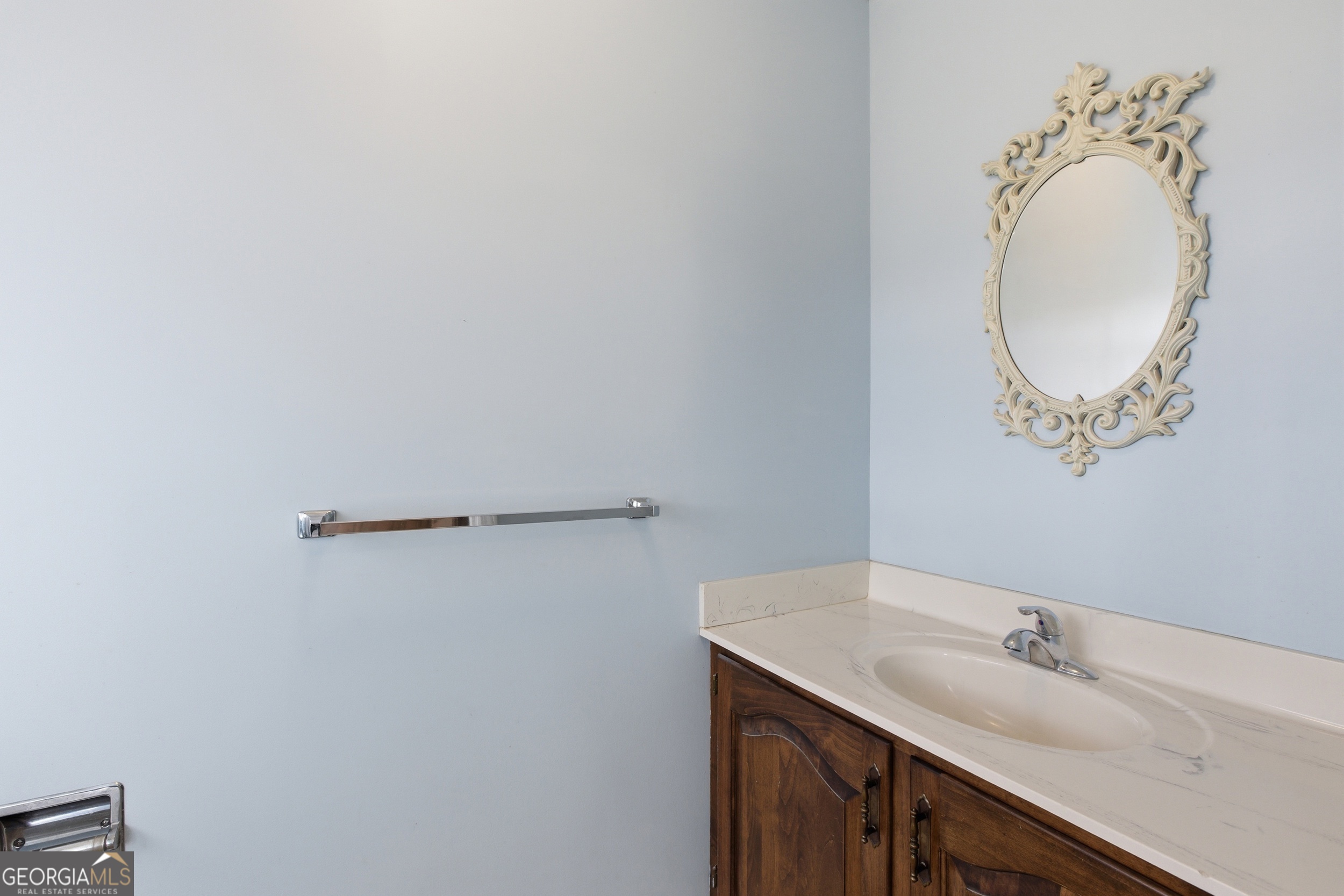 304 Beaverbrook Drive Toccoa, GA 30577 - Photo 34 of 53 a bathroom with a granite countertop sink and a mirror
