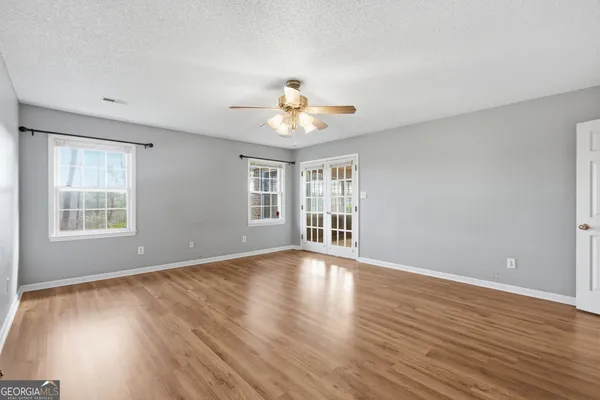 a bathroom with a glass door shower
