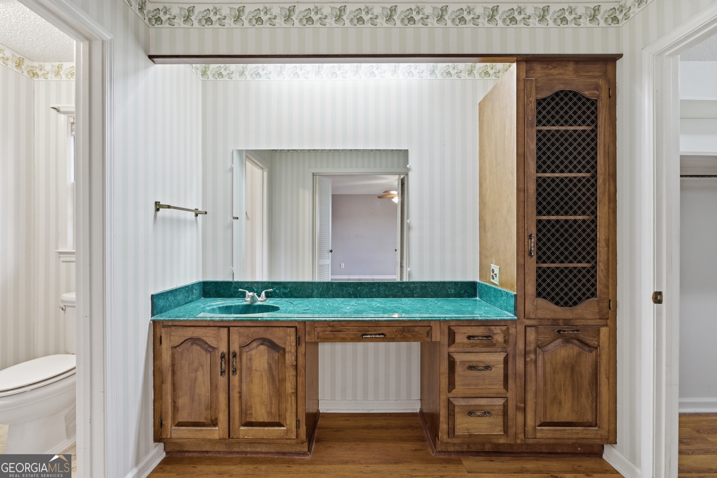 304 Beaverbrook Drive Toccoa, GA 30577 - Photo 43 of 53 a bathroom with a granite countertop sink and a mirror