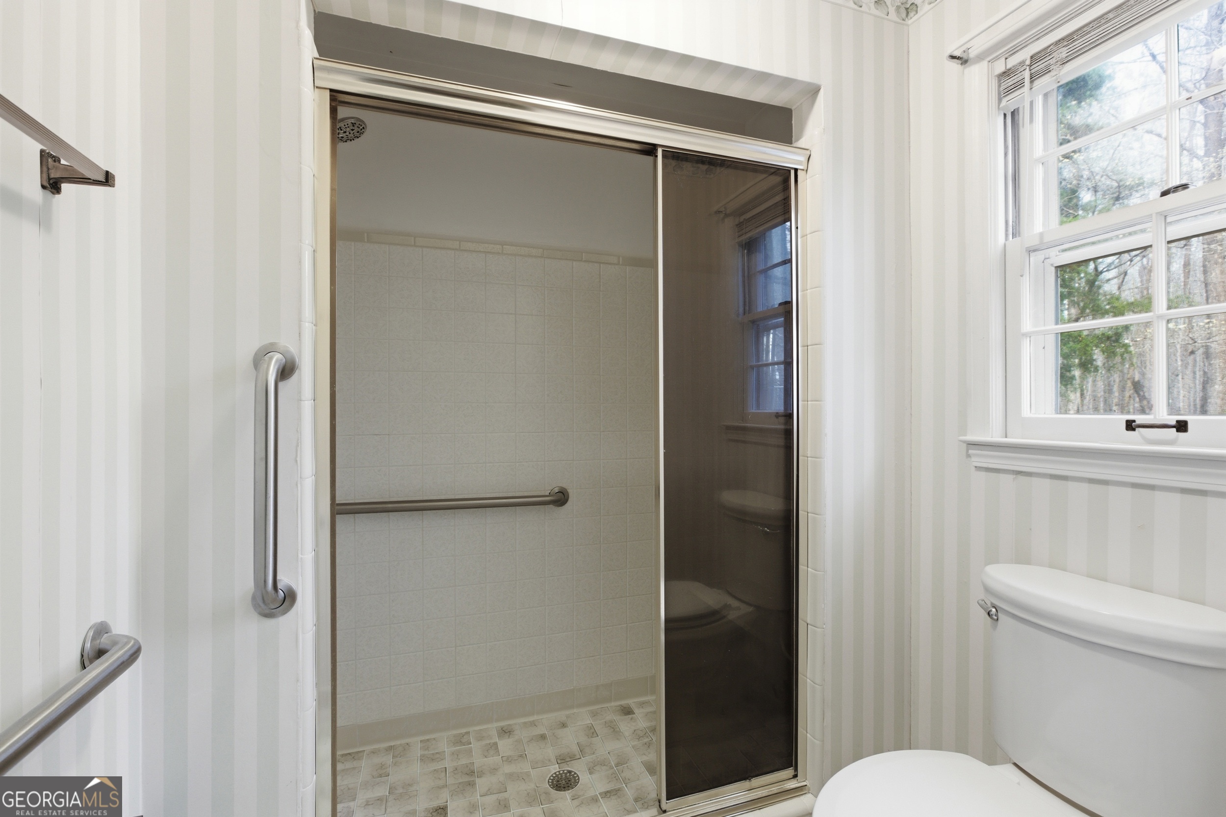 304 Beaverbrook Drive Toccoa, GA 30577 - Photo 45 of 53 a bathroom with a glass door shower