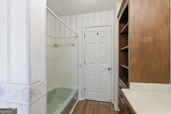 a view of an empty room and window