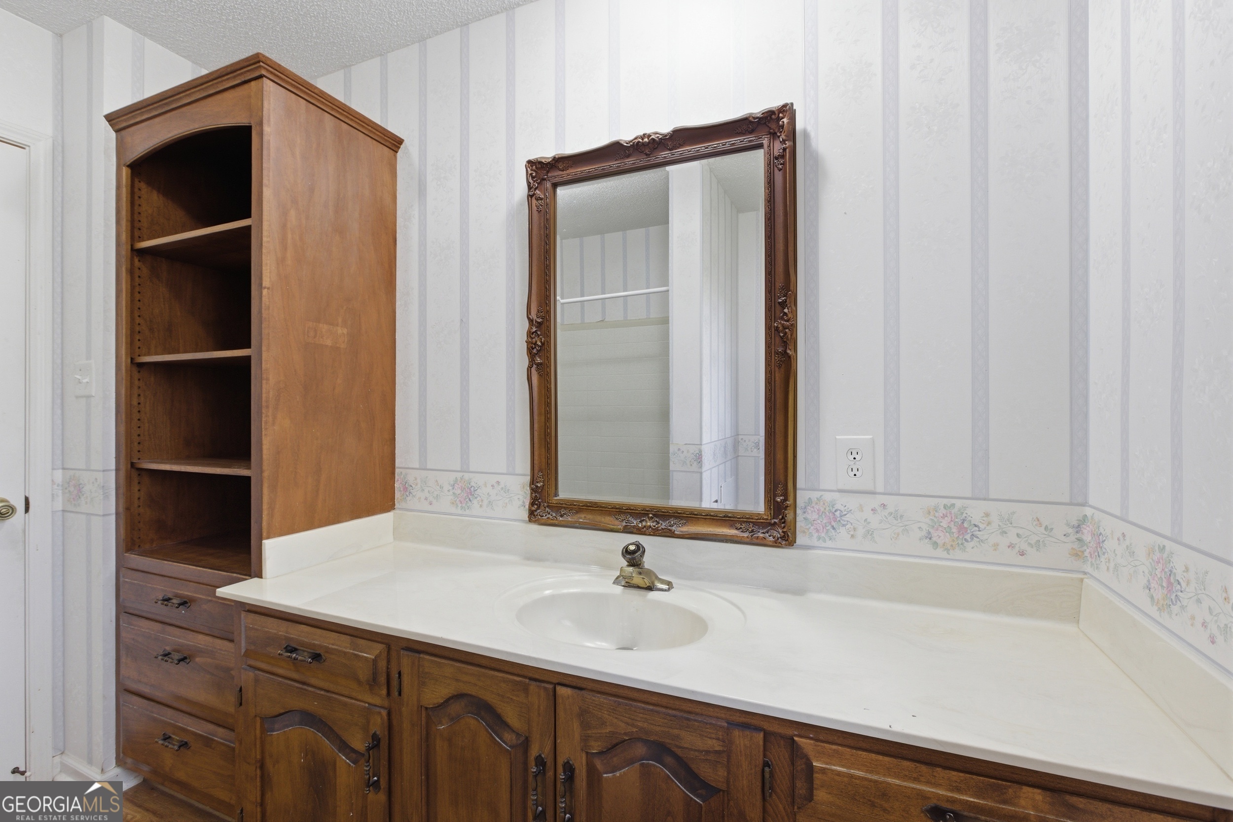 304 Beaverbrook Drive Toccoa, GA 30577 - Photo 51 of 53 a bathroom with a sink and a mirror