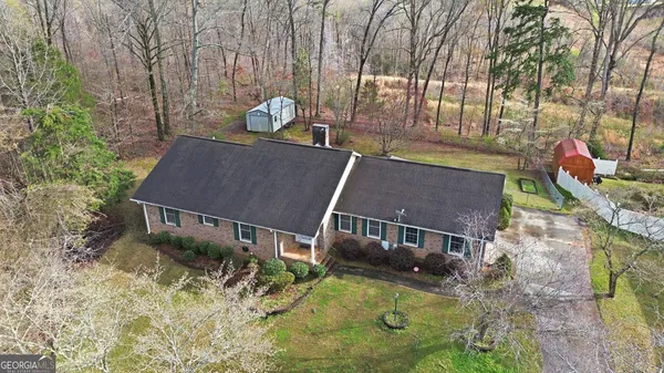 a view of house with yard
