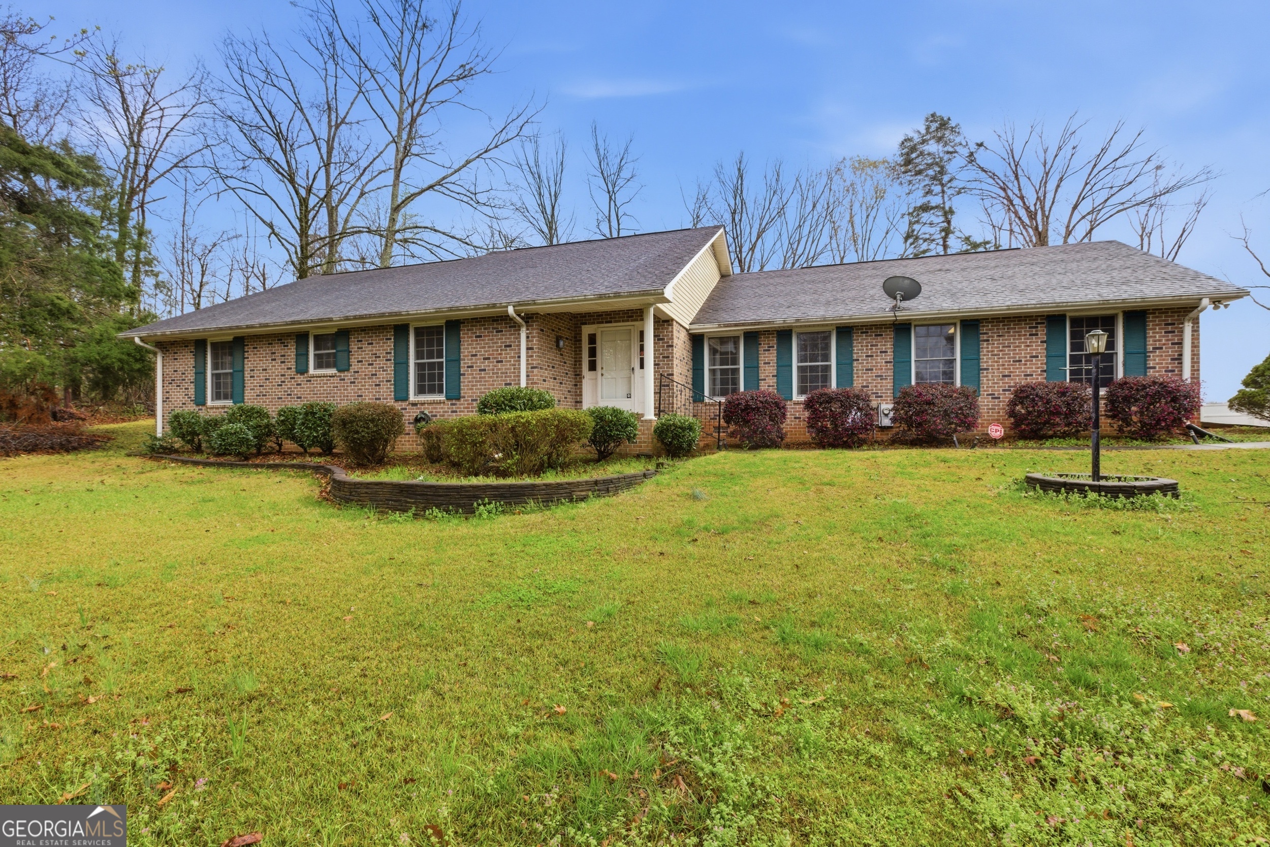 304 Beaverbrook Drive Toccoa, GA 30577 - Photo 10 of 53 a front view of a house with garden