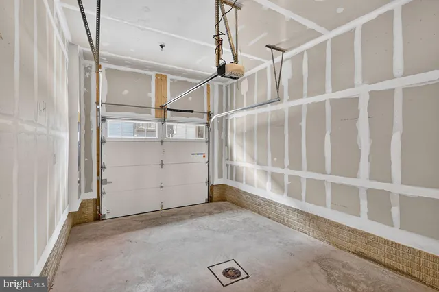 a view of brick house with a large windows