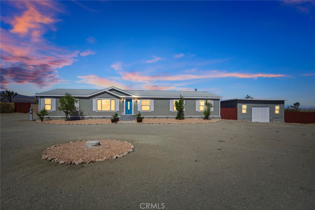 13110 Azure View Road Pinon Hills, CA 92372 - Photo 1 of 1 a view of a house with a patio