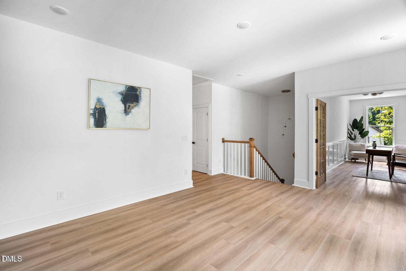 712 Oaks Lane Road Timberlake, NC 27583 - Photo 21 of 49 a view of empty room with wooden floor