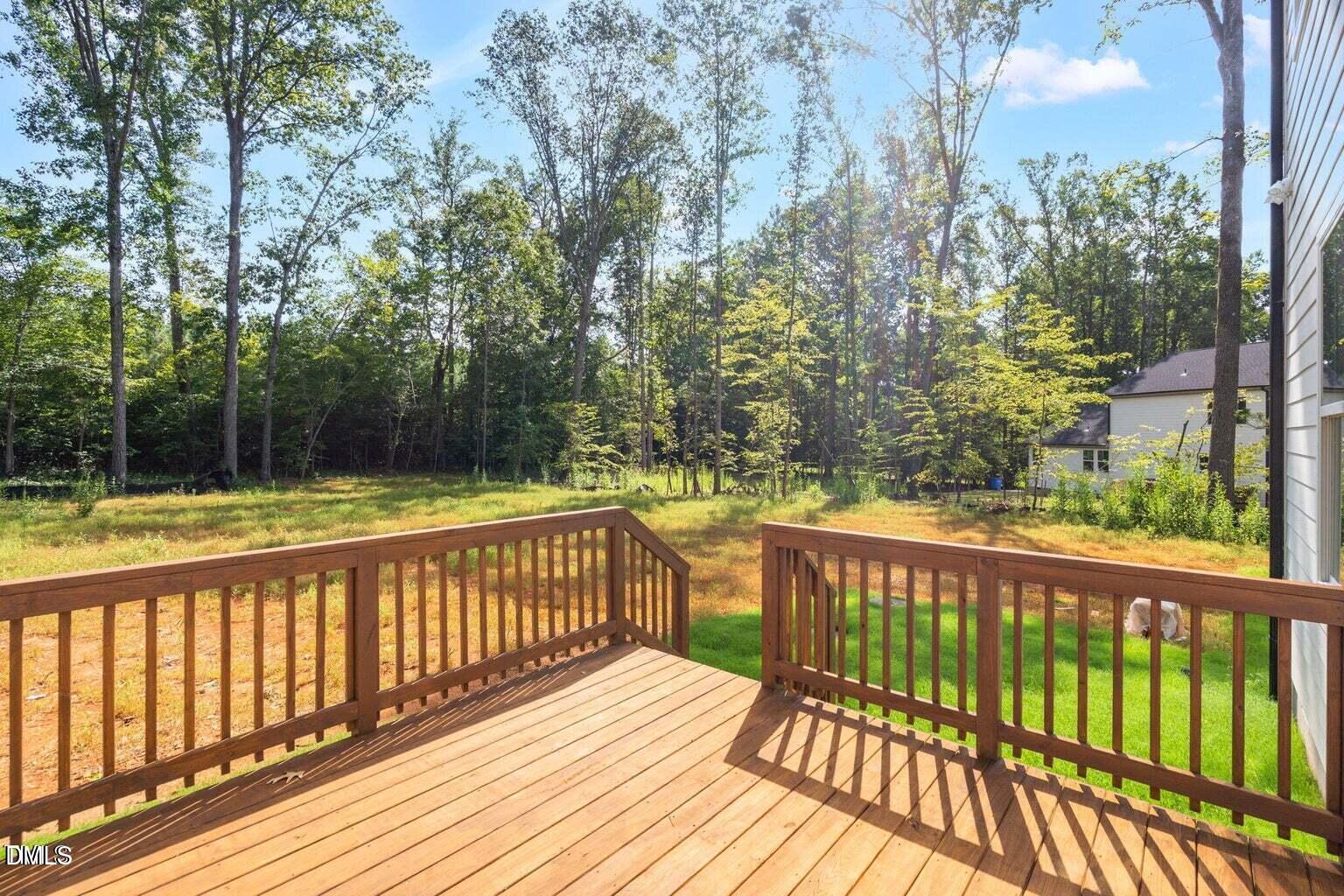 712 Oaks Lane Road Timberlake, NC 27583 - Photo 35 of 49 a view of a wooden deck